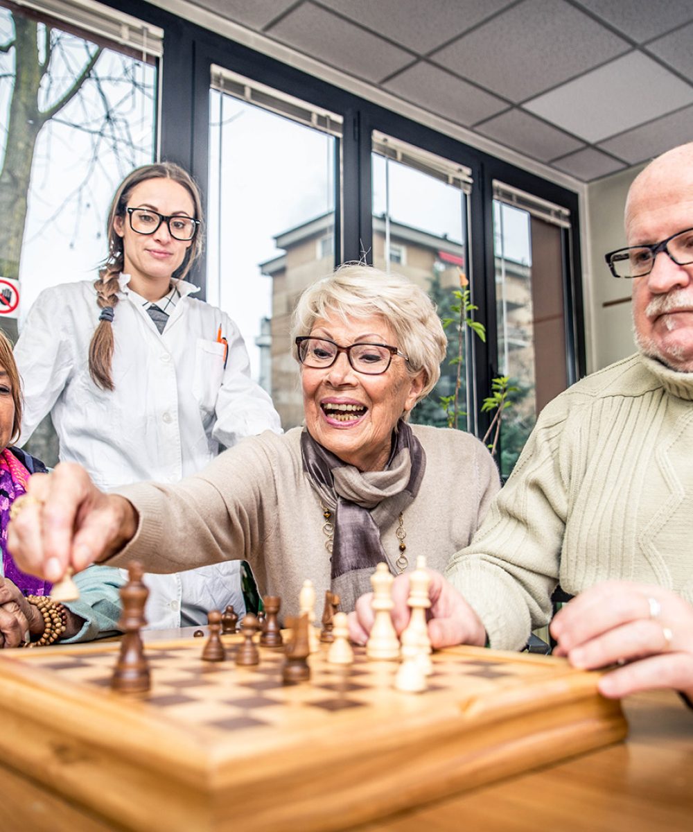 Senior people Senior adults in a nursing home for the elderly doing leisure activities